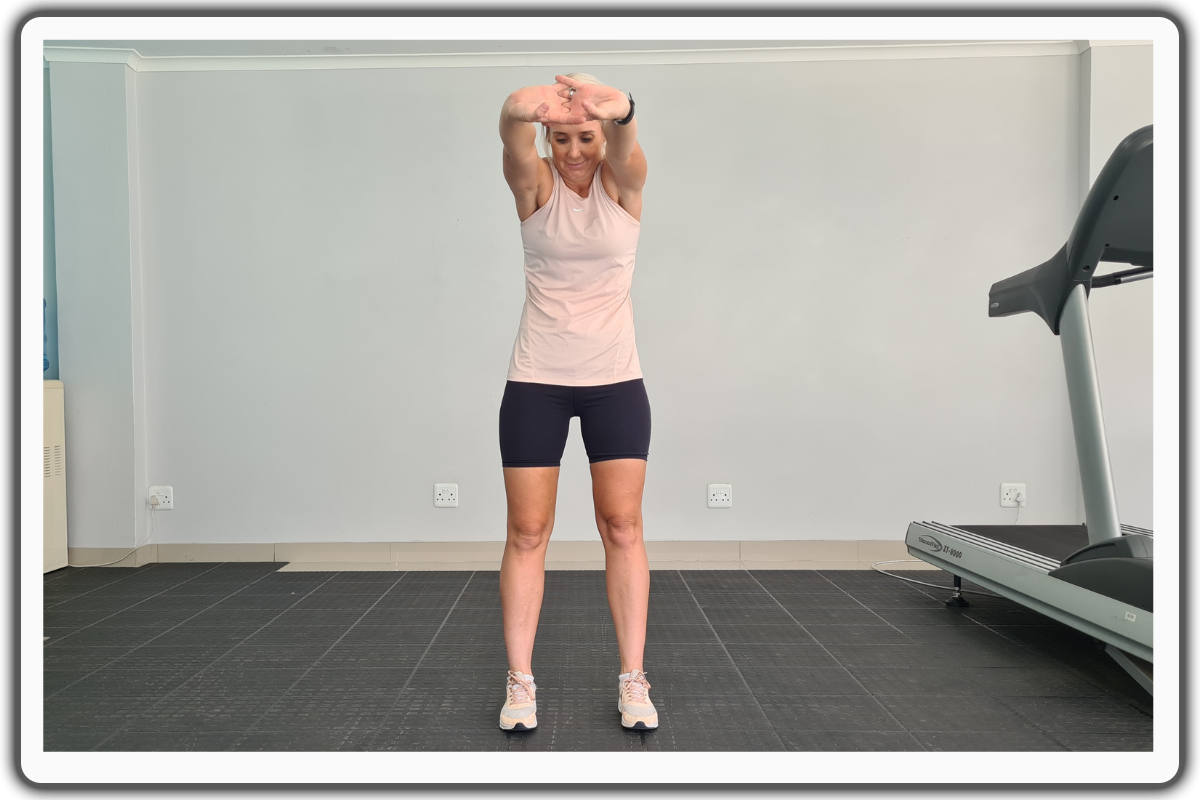 2. Standing Upper Back Stretch